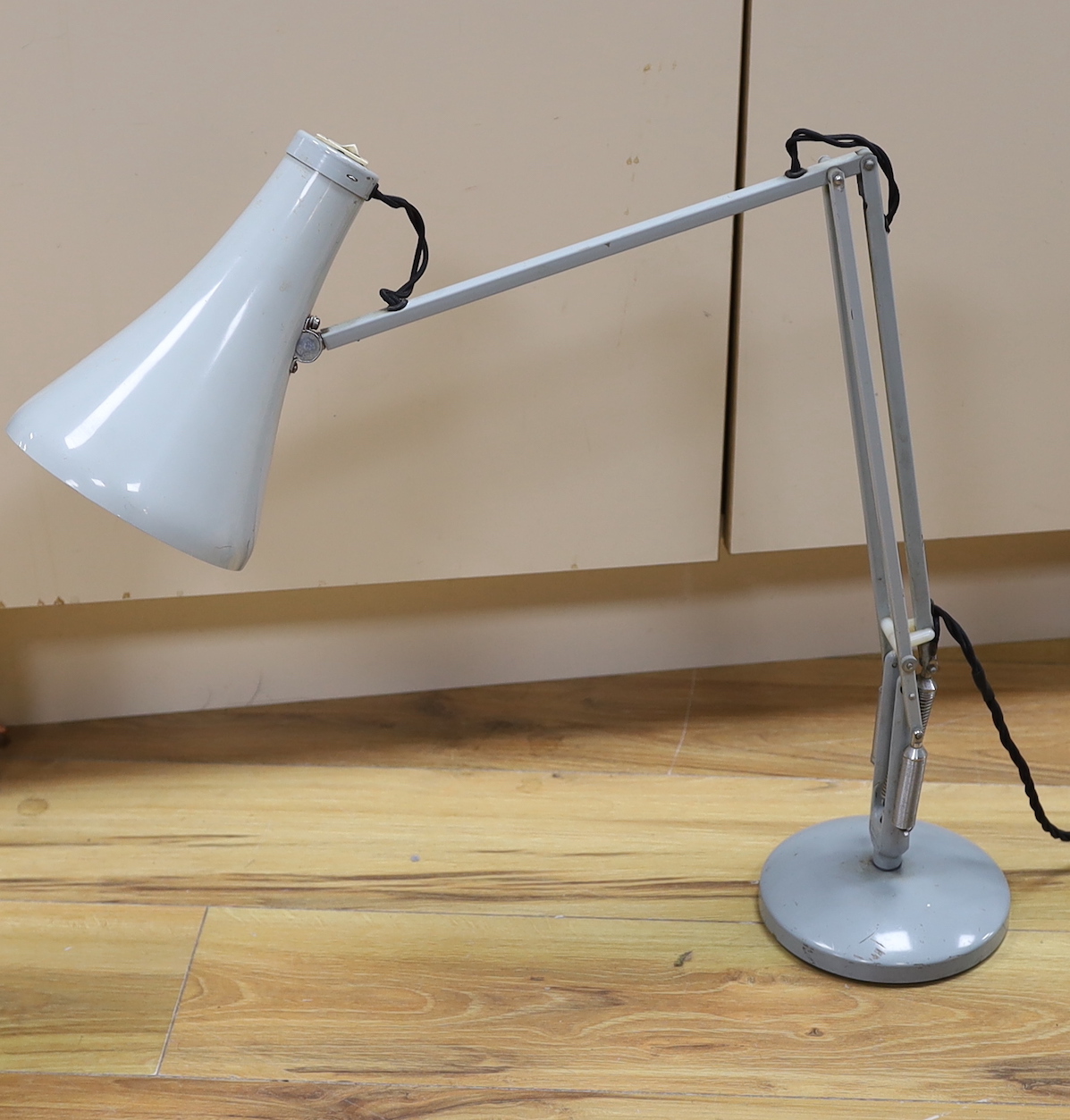 A grey anglepoise lamp